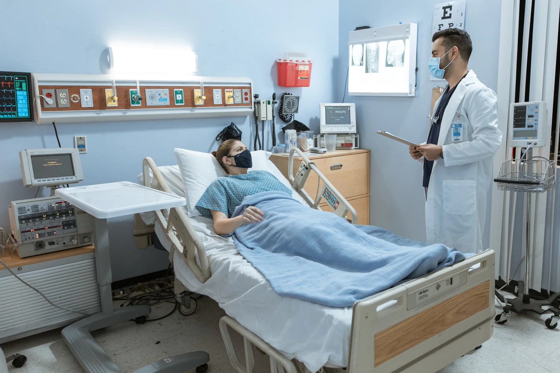 Hospital room and doctor from UniteOne brochure